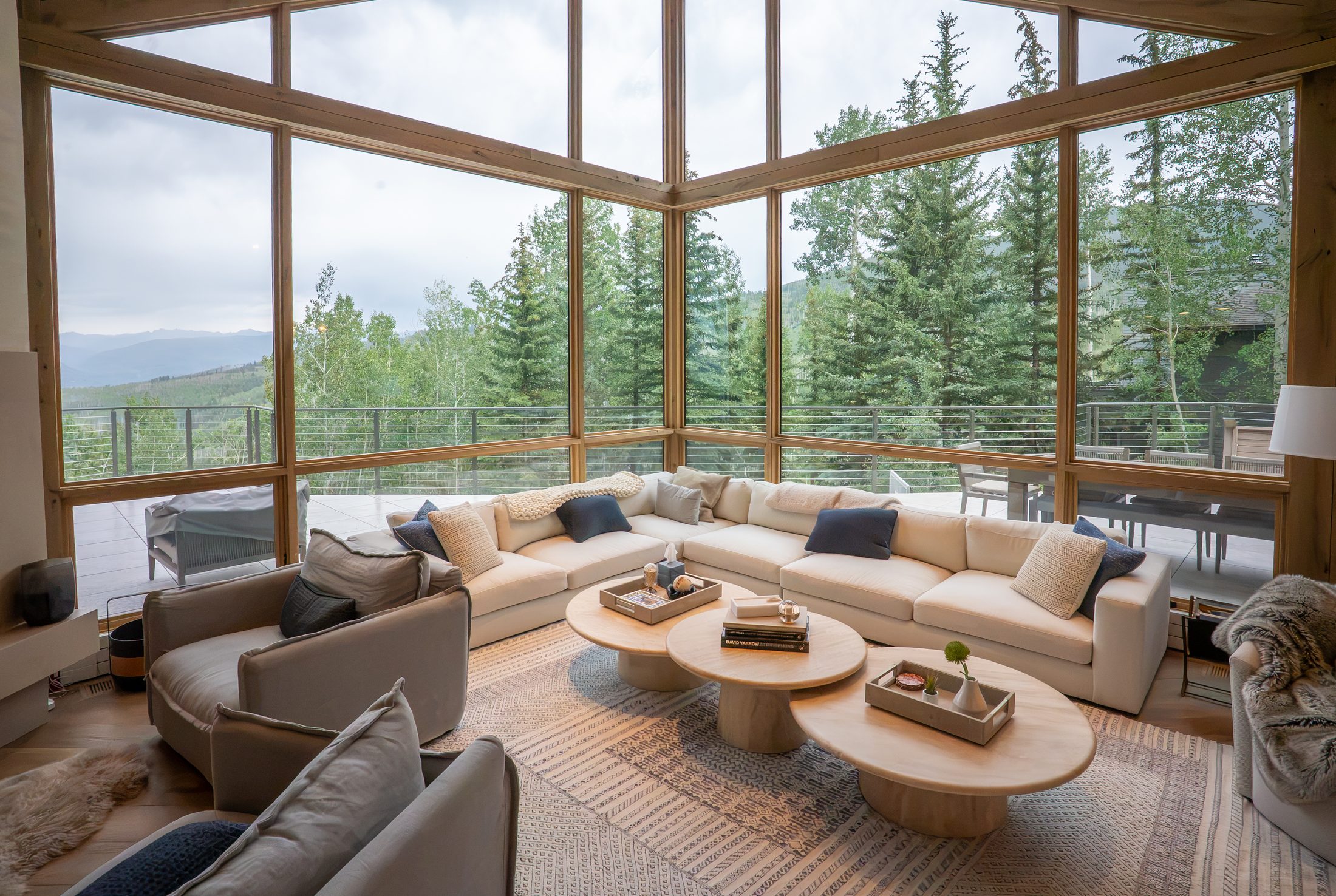 A living room behind corner glass, Snowmass, Colorado