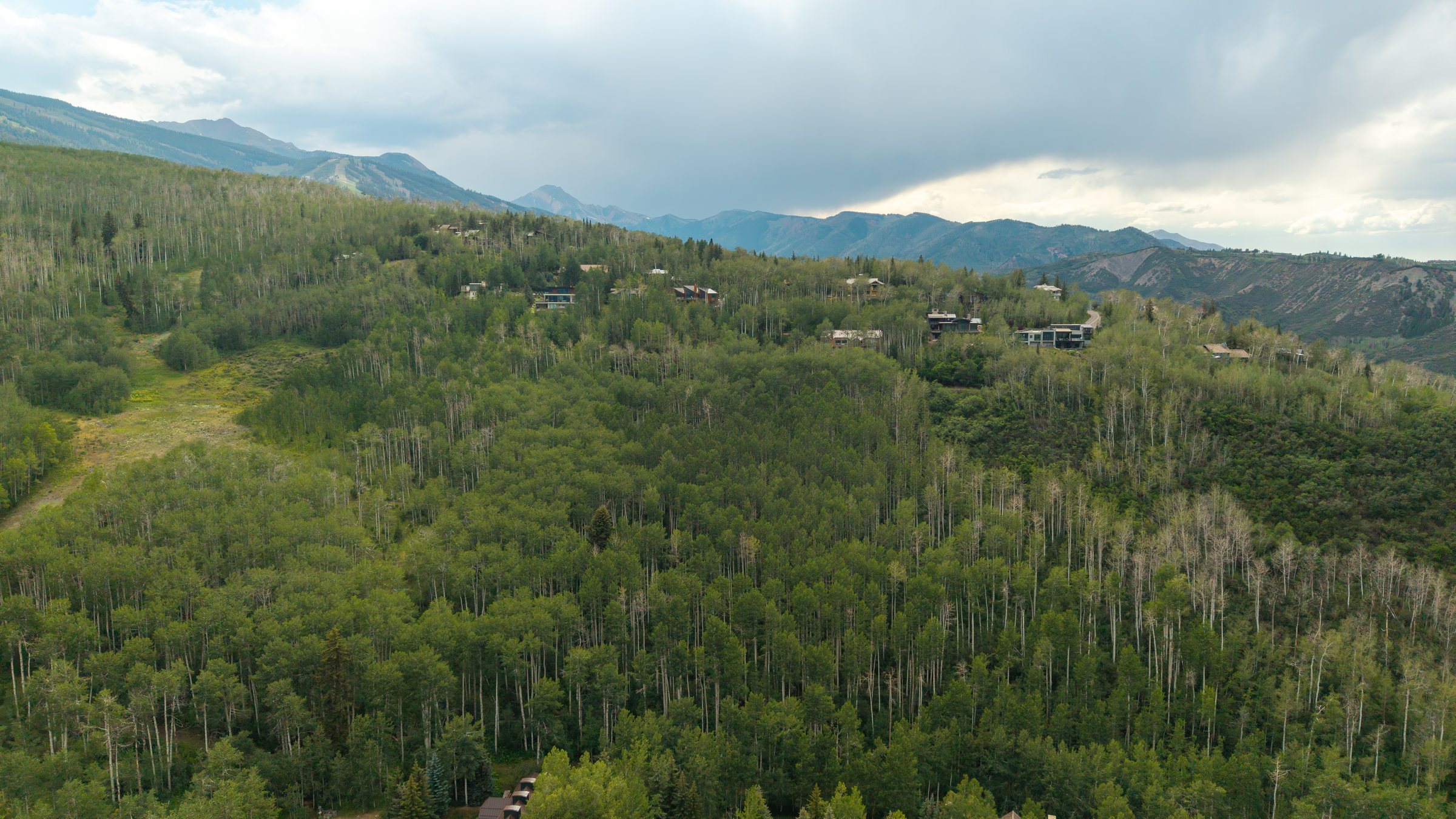 36 Ermine Lane seen from above, set in aspen and spruce